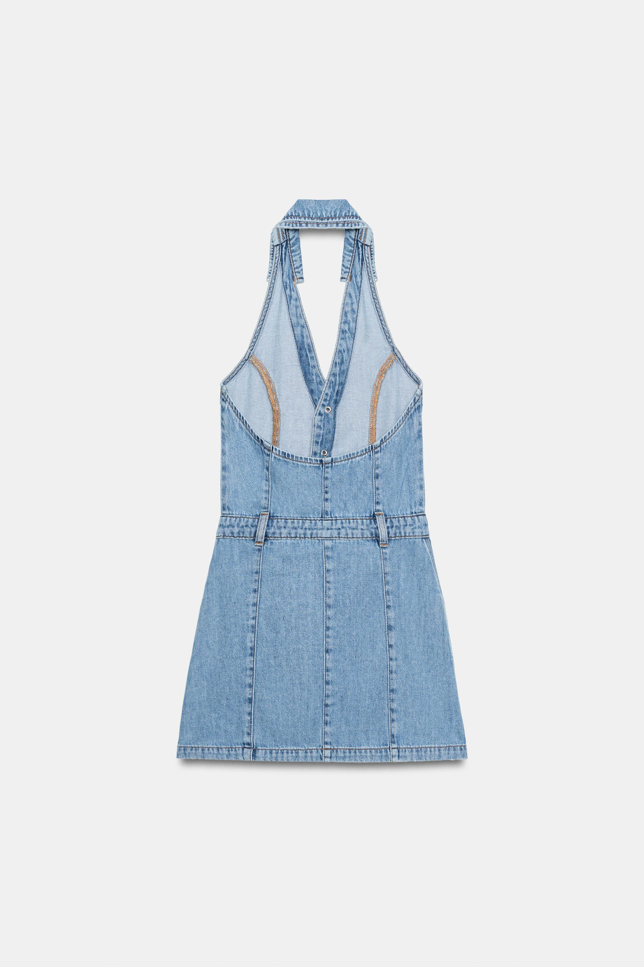Model height: 170 cmHalter neck dress with a lapel collar. Featuring a v-neck and open back. Fron... | Zara UK