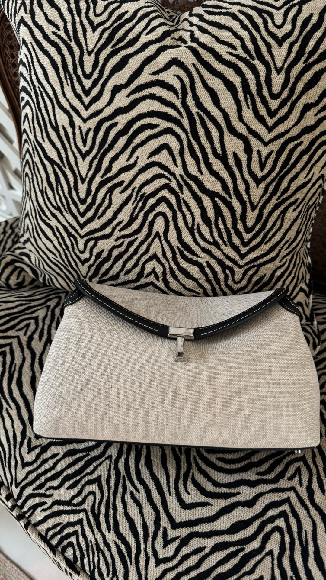 T-lock bags. Love the textured options! Found a shearling bag on sale, which is chic and timeless for winter. 

#LTKTravel #LTKSpringSale