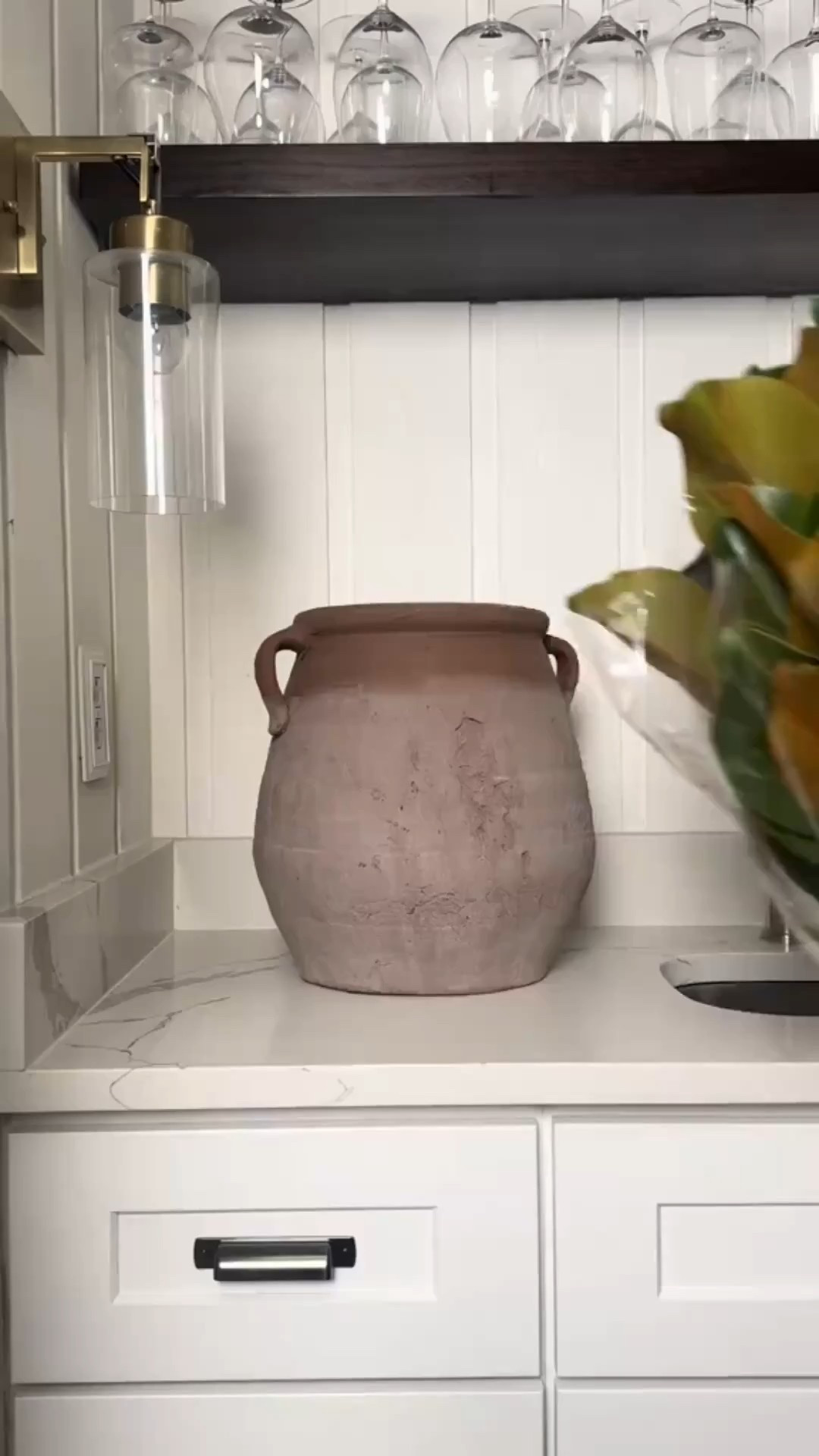 Effortless elegance in every petal 🤍

Aged terracotta urns bring so much character to any space, especially when paired with lifelike faux magnolia stems. The mix of creamy petals and glossy green leaves adds the perfect natural touch against the marble countertop and brass wall sconce. 🫶🏽

#homedecor #floralarrangement #timelessdesign #vintagedecor #eanesinteriors



#LTKHome #LTKFindsUnder100 #LTKdayinmylife