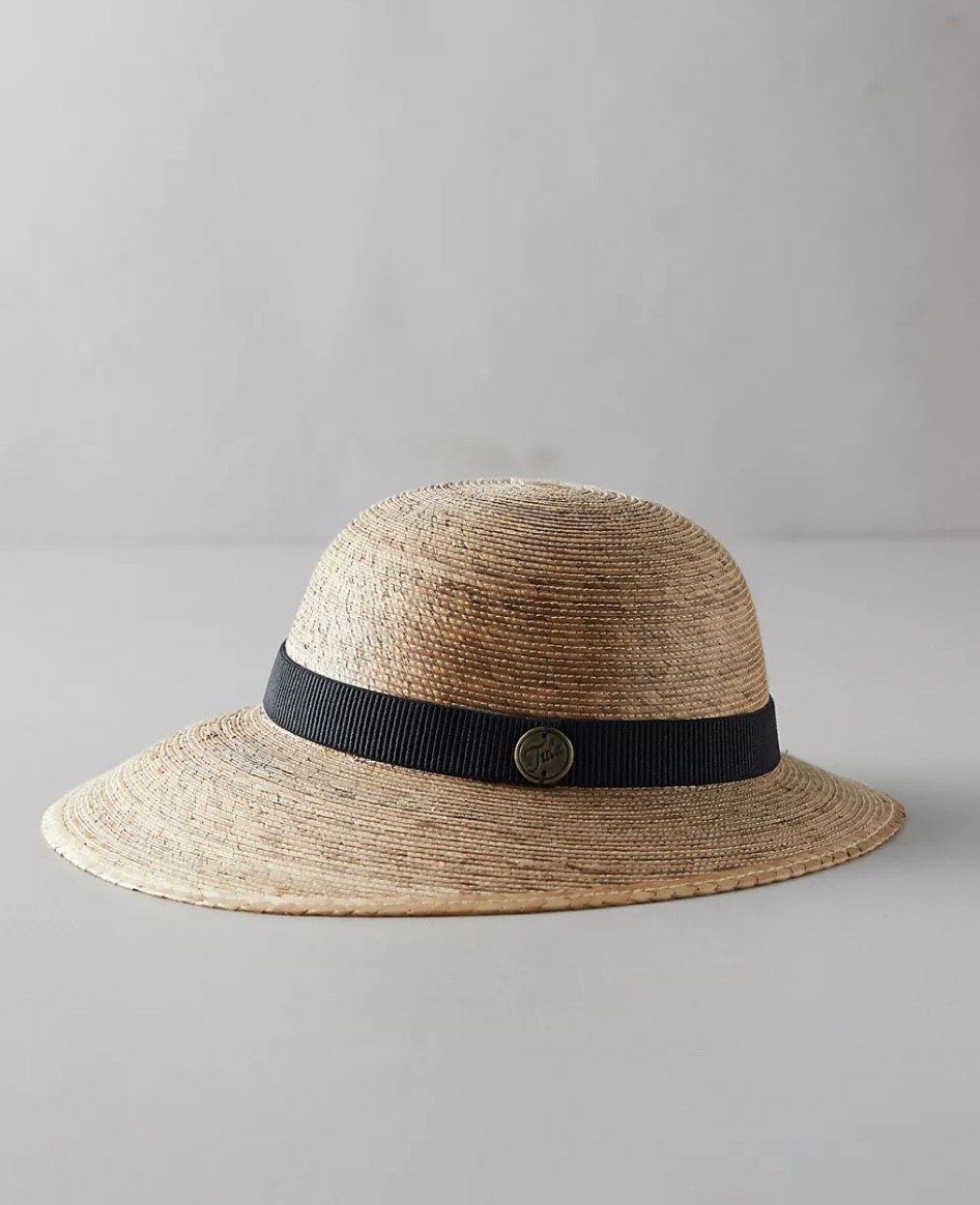 Crafted with care from sustainable palm fibers, this hat is your go-to accessory for both gardening days and beach afternoons. The soft, flexible interior band ensures a snug and comfortable fit, making it as practical as it is stylish.

**Features:**
- **Hand-Woven Palm Fibers:** Expertly crafted for durability and elegance.
- **Easy Maintenance:** Simply spot clean with a damp cloth.
- **Indoor Storage:** Preserve its shape and quality by storing it indoors.
- **Restorable Shape:** If your hat gets crushed or bent, just iron it with a protective cloth to restore its original form.

Elevate your wardrobe with a hat that's not only fashionable but also eco-friendly. Perfect for any occasion, this hat is a must-have for the conscious consumer. Get yours today and step out in sustainable style! 

#SustainableFashion #EcoFriendly #HandwovenHat #SummerStyle #GardenReady #BeachDayEssentials

#LTKGiftGuide #LTKHome #LTKSeasonal