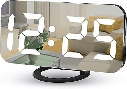 Digital Alarm Clocks,7" LED Mirror Electronic Clock,with 2 USB Charging Ports,Snooze Mode,Auto Ad... | Amazon (US)