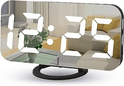Digital Alarm Clocks,7" LED Mirror Electronic Clock,with 2 USB Charging Ports,Snooze Mode,Auto Ad... | Amazon (US)