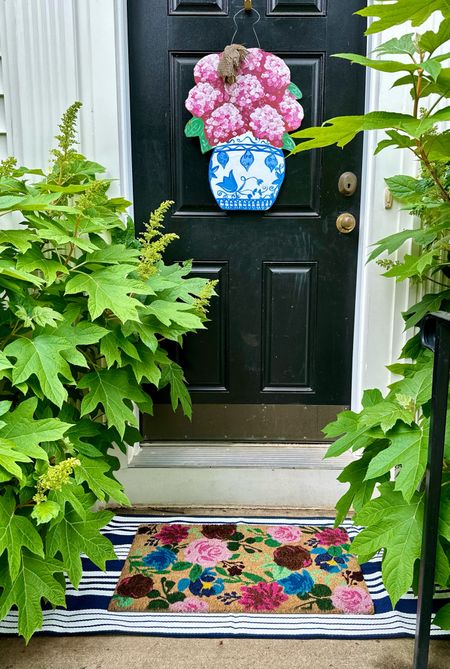 Have had this door hanger for over 2 years- so pretty. Need to change the ribbon, but it’s still pretty! Loving the new doormat & rug I have for the front door right now. 

#LTKHome #LTKFindsUnder50