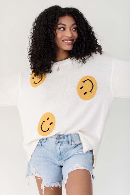 Smiley face sweatshirt from The Post 

#LTKunder100 #LTKSeasonal #LTKitbag