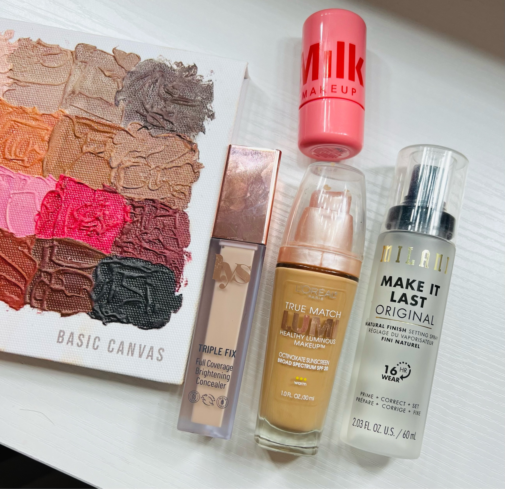 Something new & something tried and true!! This foundation is not talked about enough!! The best setting spray I will choose over any high end. My new favorite concealer and a little color to set off that cheek bone! 💄