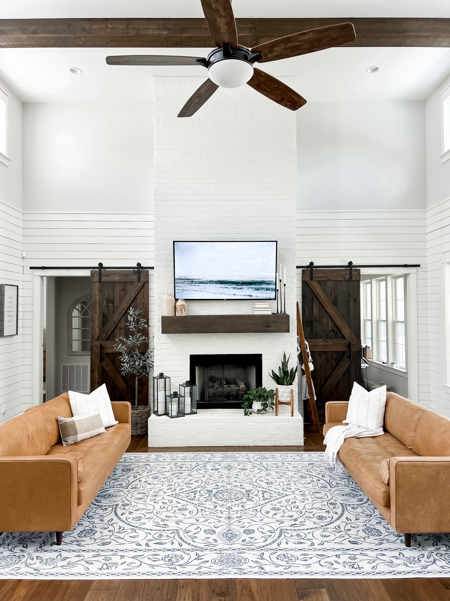 Living room decor leather couch sofas ruggable washable rug luxe heritage ceiling fan modern farmhouse family room great room area rugs living room styling twin double couches modern farmhouse organic modern furniture interior design home finds open concept layout throw pillows blanket olive tree faux plants and trees

#LTKMostLoved #LTKhome #LTKstyletip