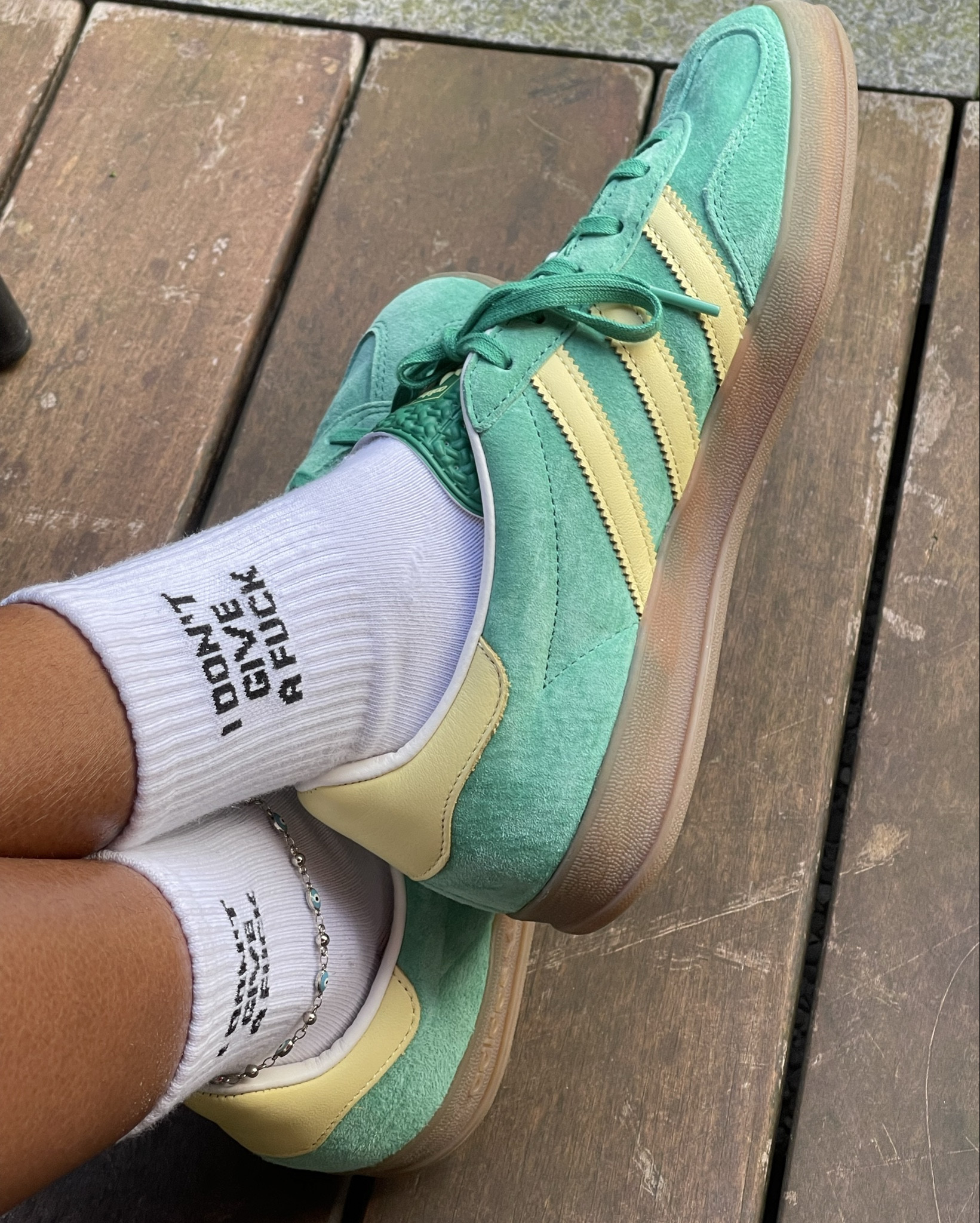 Love this shoe & sock combo. Can never go wrong!

✨Socks - IDGAF socks 
✨Jewelry - light blue evil eye anklet
✨Sneakers - Adidas Gazelle in Semi Court Green, Almost Yellow and Gum

#LTKStyleTip #LTKSaleAlert #LTKShoeCrush