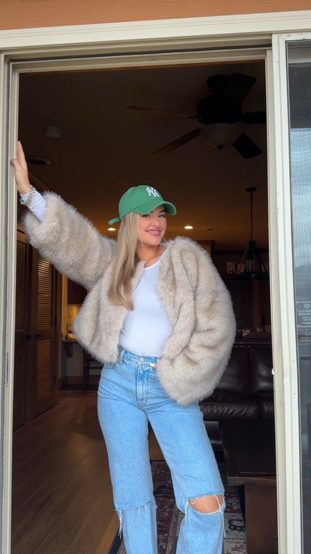 Mob wife era ootd🤍 size 27 long color light in the jeans (I added the knee rips), size S in the top & M in the fur coat! 

#LTKSeasonal #LTKSpringSale #LTKfindsunder100