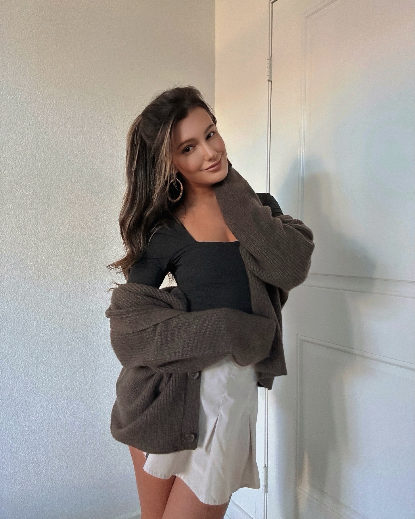 cashmere cardigan, brown cardigan, oversized cardigan, oversized sweater, black bodysuit, black long sleeve bodysuit, sale, mini skort, pleated skort, holiday party outfit, winter coat  

#LTKHoliday #LTKGiftGuide #LTKSaleAlert