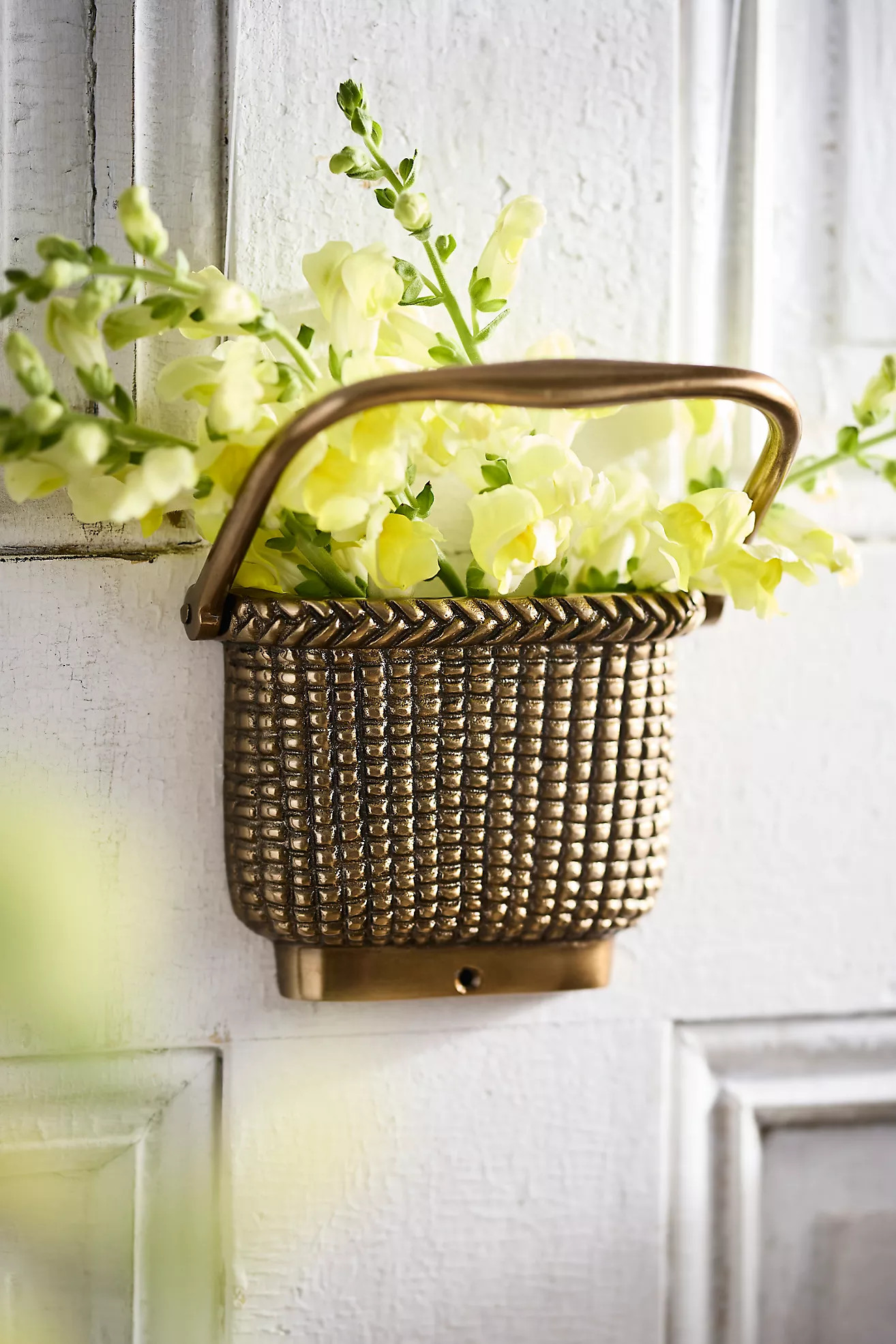 Fillable Basket Door Knocker
 | Anthropologie (US)
