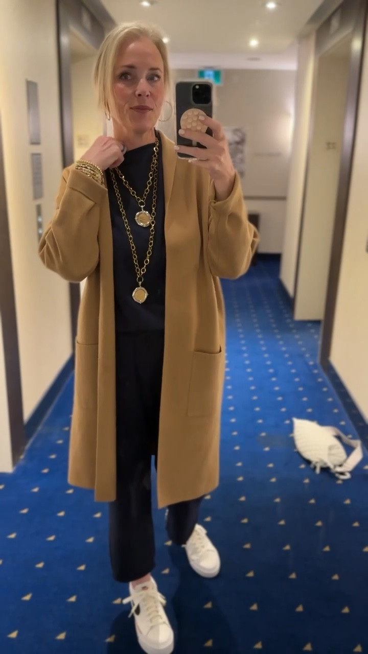 For travel day 5, I'm keeping it cozy and chic with this navy lounge set, a fabulous Frank and Eileen Look For Less. Topped it off with a cozy long coat and my favorite Nike court legacy lifts. 

Accessories are key, so I’ve got my Mz Wallace sling bag for all the essentials and my go-to jewelry pieces from Amazon, Loft, Victoria Emerson, and Jennifer Ponson. ✨ 

If you use my link for Jennifer Ponson, when you get to the checkout part, put Lauren10 for the coupon code. If you put Lauren10, then hit
"apply" then type in "freeship," and hit "apply," you will get free shipping in addition to 10% off.  https://www.jenniferponson.com/discount/Lauren10 

Shop my entire look and get ready for your own stylish adventures! 🌟

#LTKOver40 #LTKStyleTip #LTKTravel