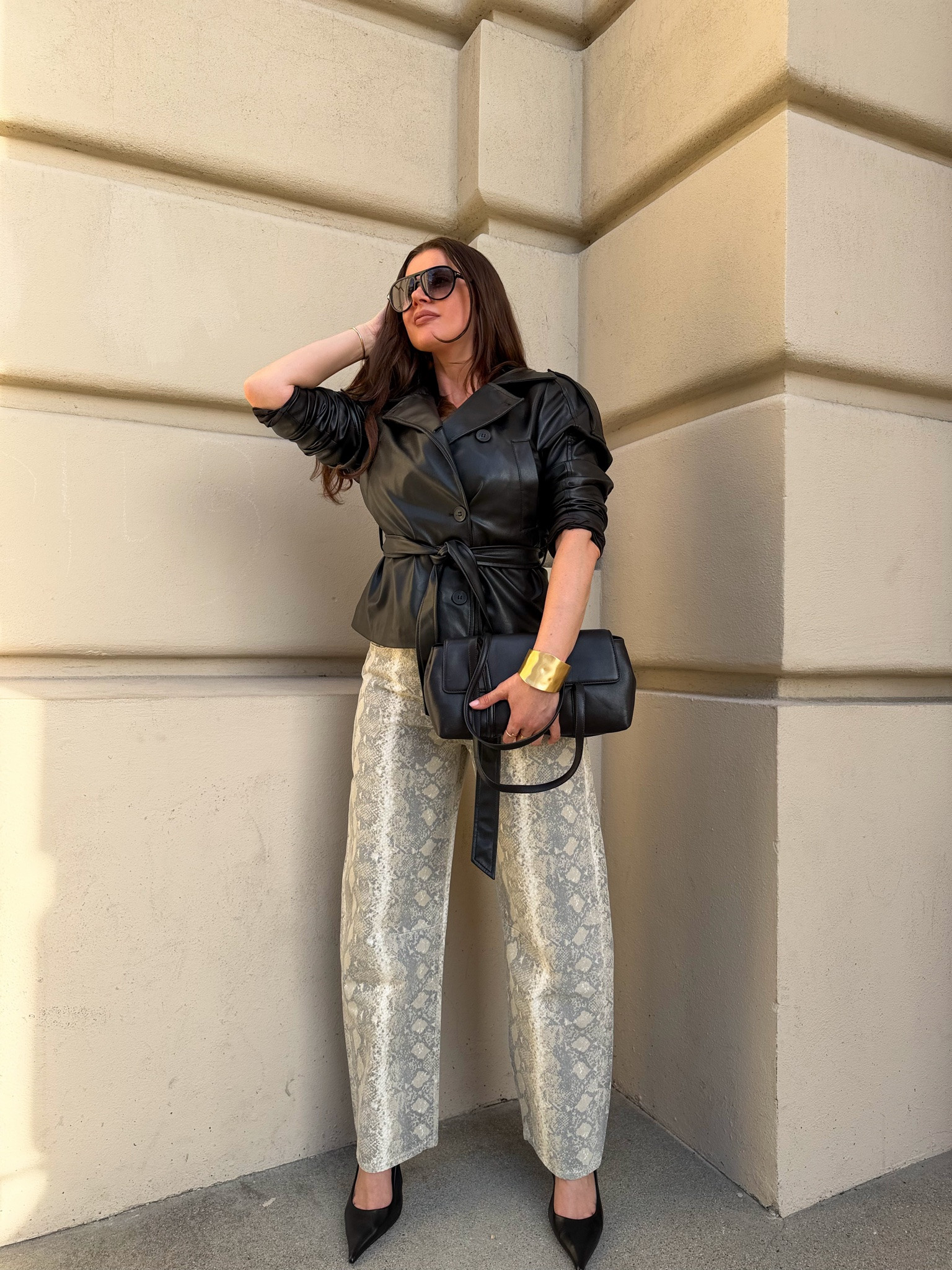 Fall outfit idea. Styling snake print pants with black a leather jacket, black slingbacks, black purse and aviator glasses. 
#falloutfits #falloutfitswomen #casualoutfit #falljacket

#LTKgrwm #LTKootd #LTKSeasonal