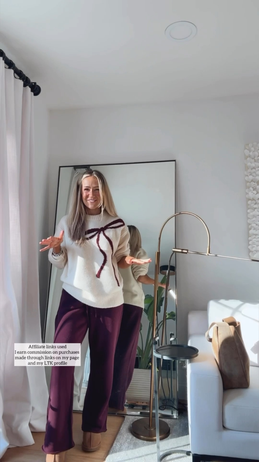 Casual holiday outfit

Christmas sweater
Bow sweater
Holiday travel outfit
Uggs 