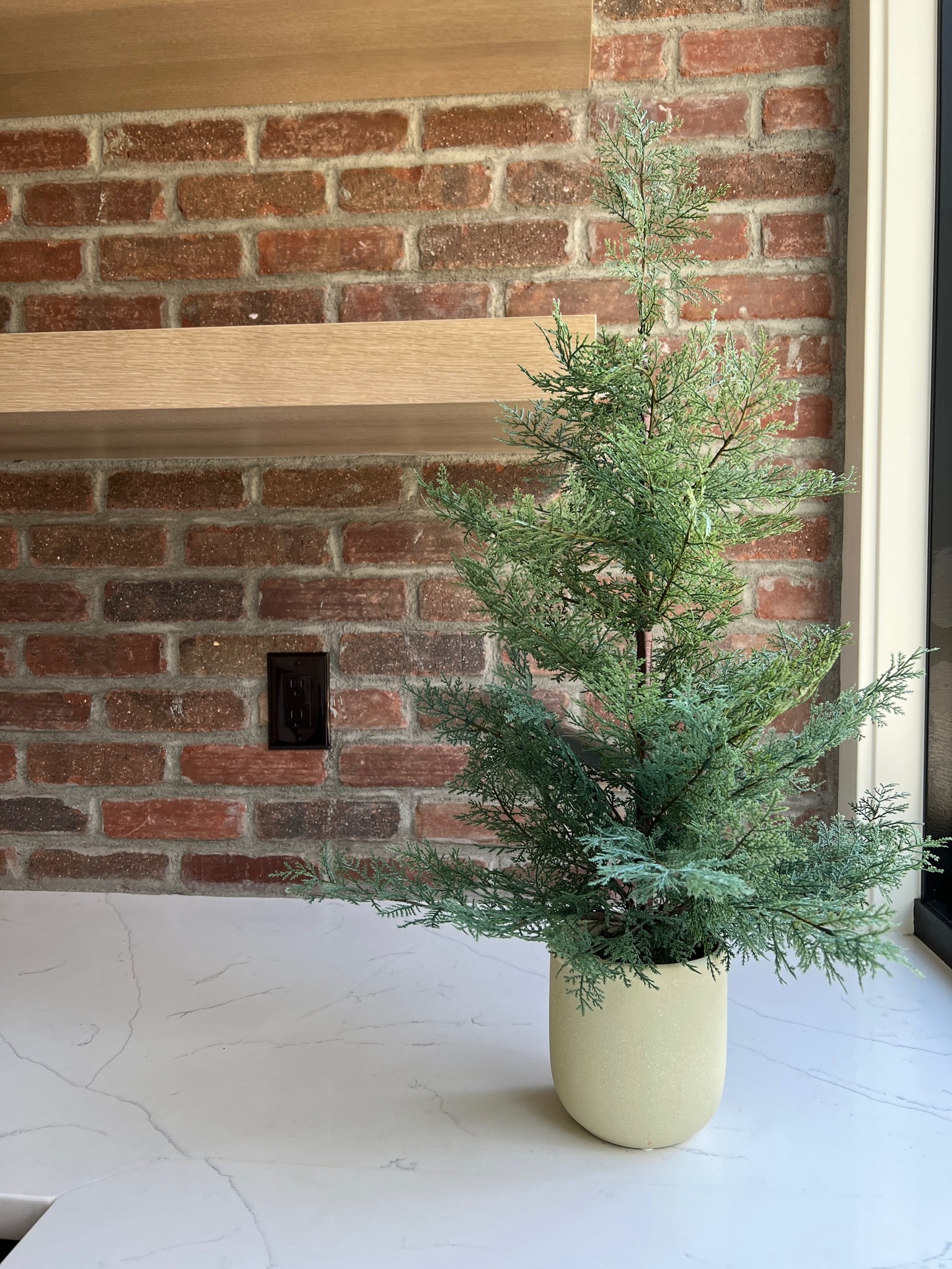 It’s the cutest little fluffy tree! A Christmas Target find. 

#LTKhome #LTKHoliday #LTKSeasonal