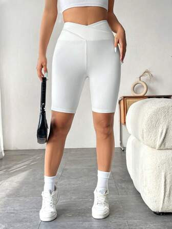 SHEIN Essnce Solid Color Overlap Waist Leggings | SHEIN