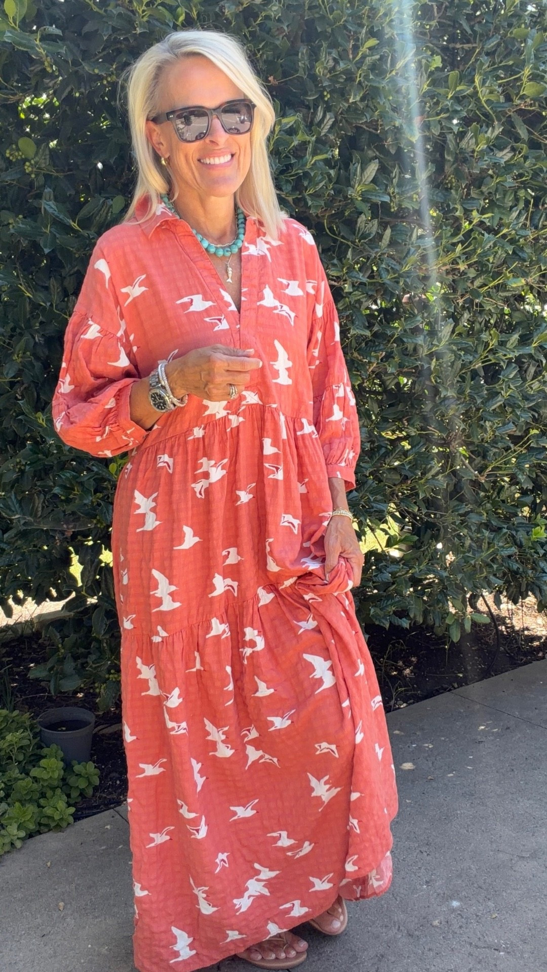 This Celandine Carolita Long-Sleeve Dress is such a beautiful warm-weather find. I love the soft coral color, white bird print, relaxed silhouette, and easy tiered shape, it feels feminine and effortless without being fussy. It’s the kind of dress that works beautifully for lunch, vacation, a summer gathering, or an easy day out with sandals. Plus and petite sizes are already limited, so I’d take a look soon if you need one of those sizes.

💡 LTK MADE EASY
❤️ Heart = Support my posts!
🔖 Save = Get sale & restock alerts
📋 Lists = Keep favorites organized
📲 Share = Send lists and products to a friend. Hello, Christmas List!
💬 Comment = Ask me anything about what I’m wearing.:-)

#LTKootd #LTKOver40 #LTKTravel