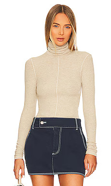 Mads Turtleneck in Beige Melange | Revolve Clothing (Global)