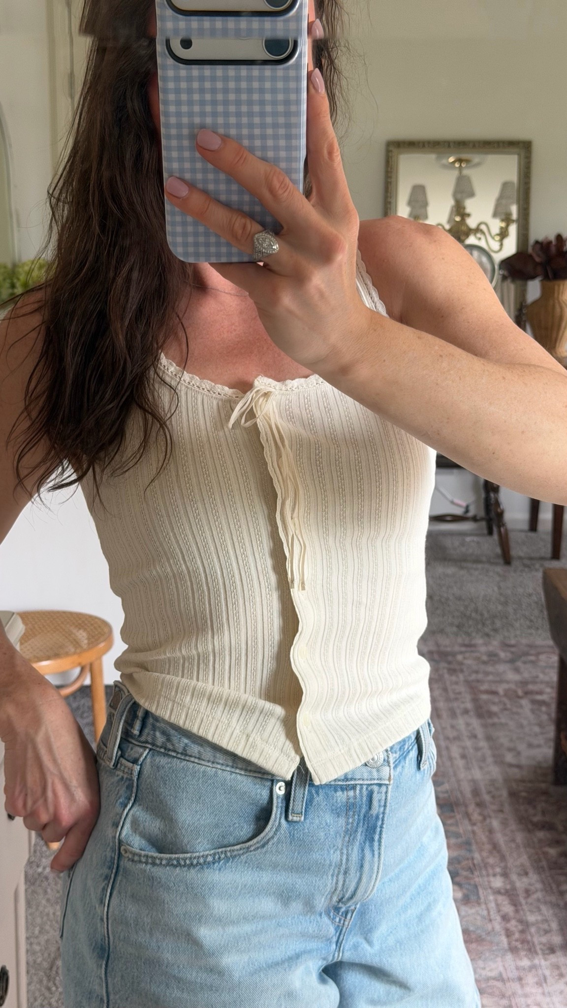 This dainty tank is so pretty and feminine. On sale now for $14.

#LTKSaleAlert #LTKootd