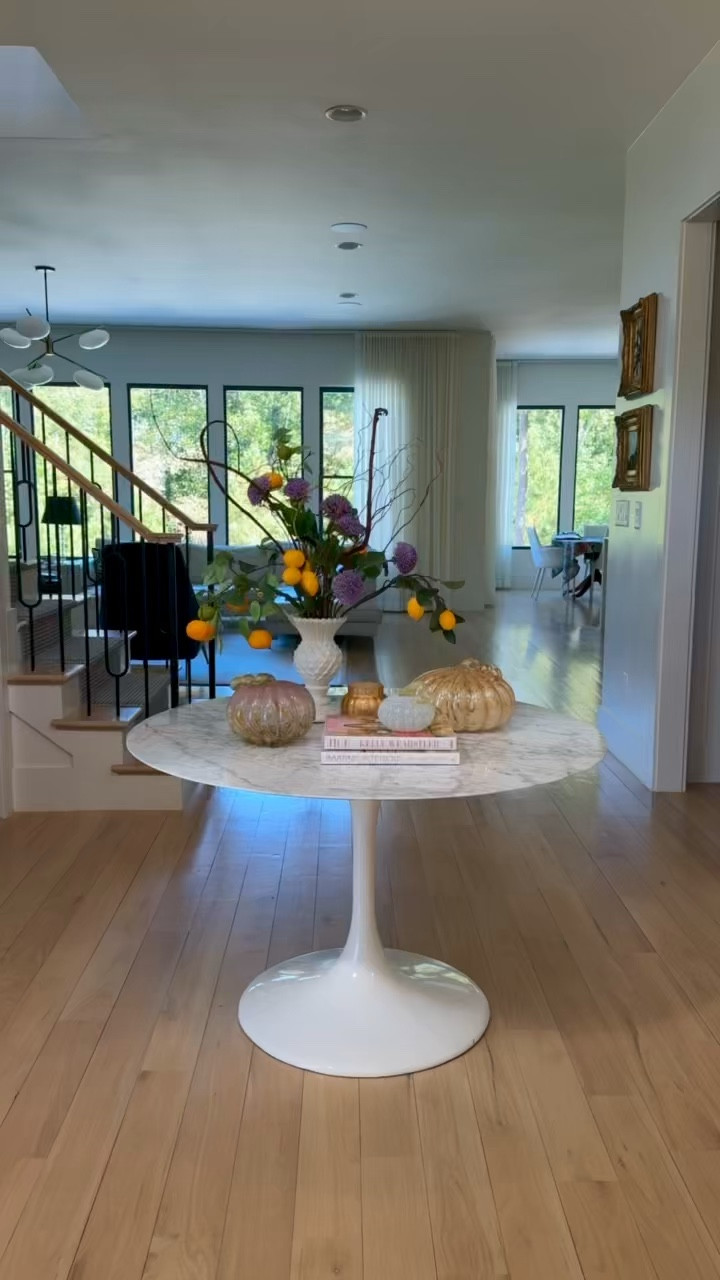 I love a good entryway arrangement for each season, and if you watched our house tour you’ll remember we designed this entry area to feel similar to a hotel welcome lobby. 
                                  
Good news….you don’t need anything fancy or specially designed to add something YOU find beautiful, somewhere in your home to celebrate the season. 
                        
Here I’m using favorite glass pumpkins and some faux lemon lime branches plus a fall candle, to say “Fall is Here” each time we walk by. A🏡🍁🍂

#LTKhome #LTKVideo #LTKSeasonal