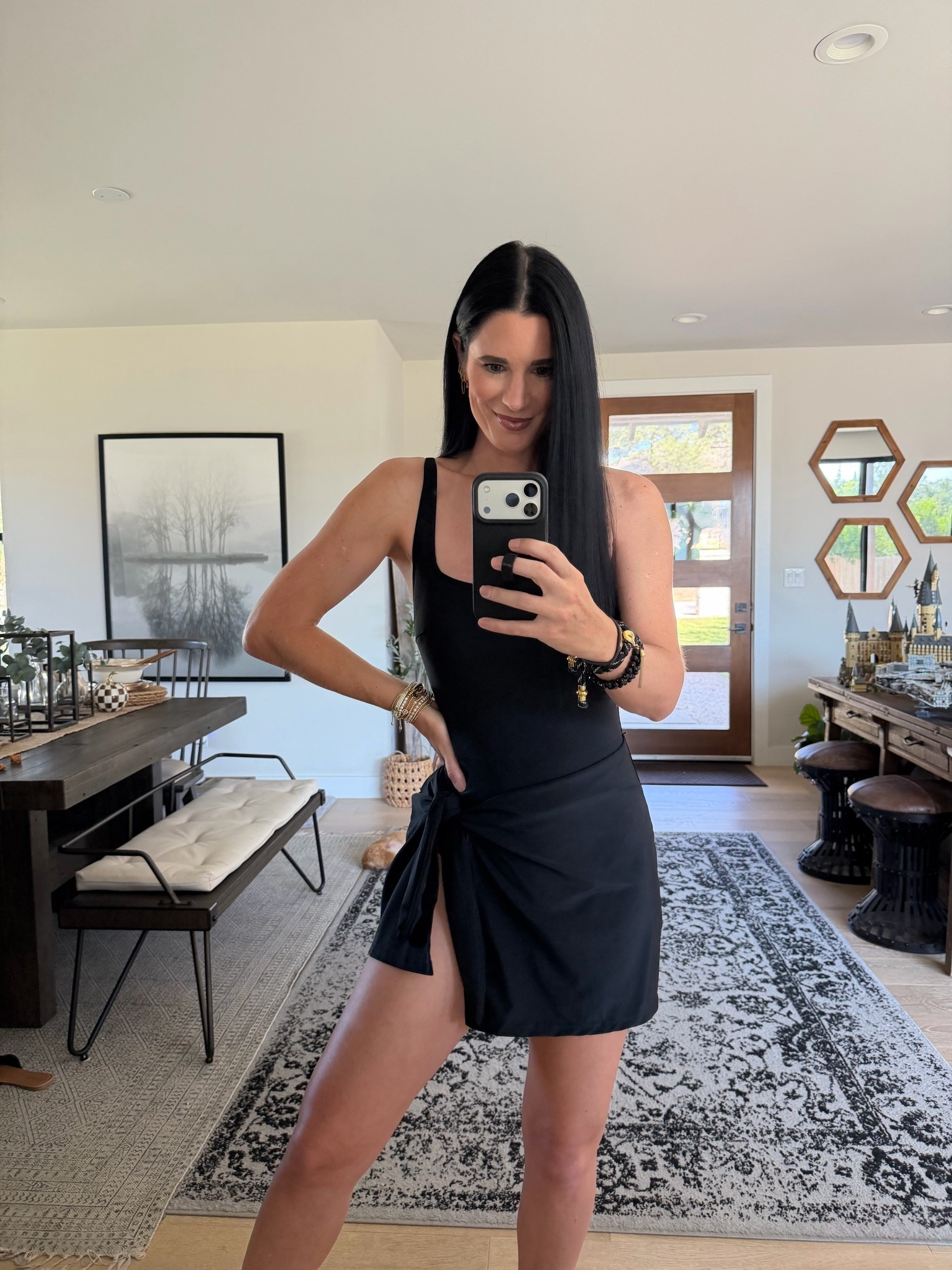 If you are looking for a full coverage, one piece bathing suit with a built-in cover-up, look no further. I love that this suit offers amazing tummy control as well and it’s only $40. I’m wearing the size medium.

#LTKSwim #LTKOver40 #LTKTall