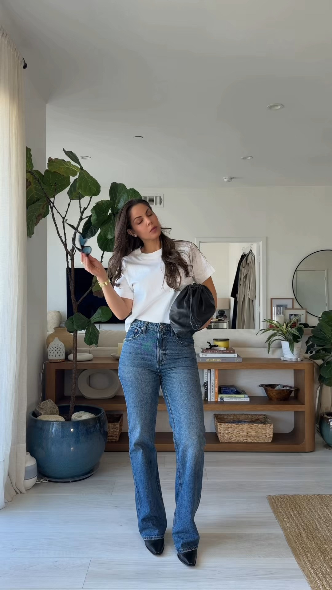 Proof that minimalist outfits can still feel luxurious ✨
A white tee, bootcut jeans, and black boots—finished with elevated accessories for a look that feels refined without overthinking it. 

 #LTKgrwm #LTKootd #LTKOver40