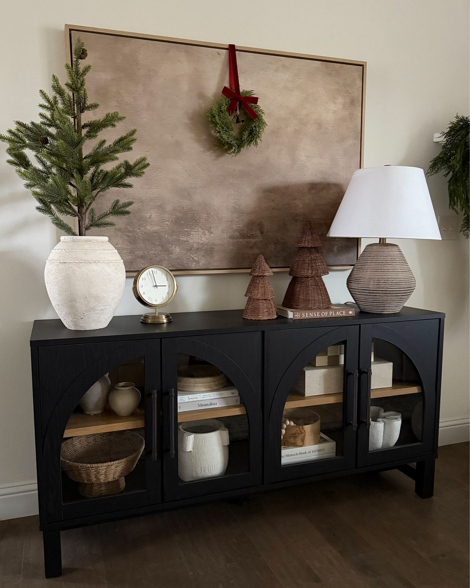 Holiday styling doesn’t always mean more—it can just mean intentional 🎄 Subtle holiday touches brought this media cabinet to life with quiet seasonal warmth.

#LTKHoliday #LTKHome