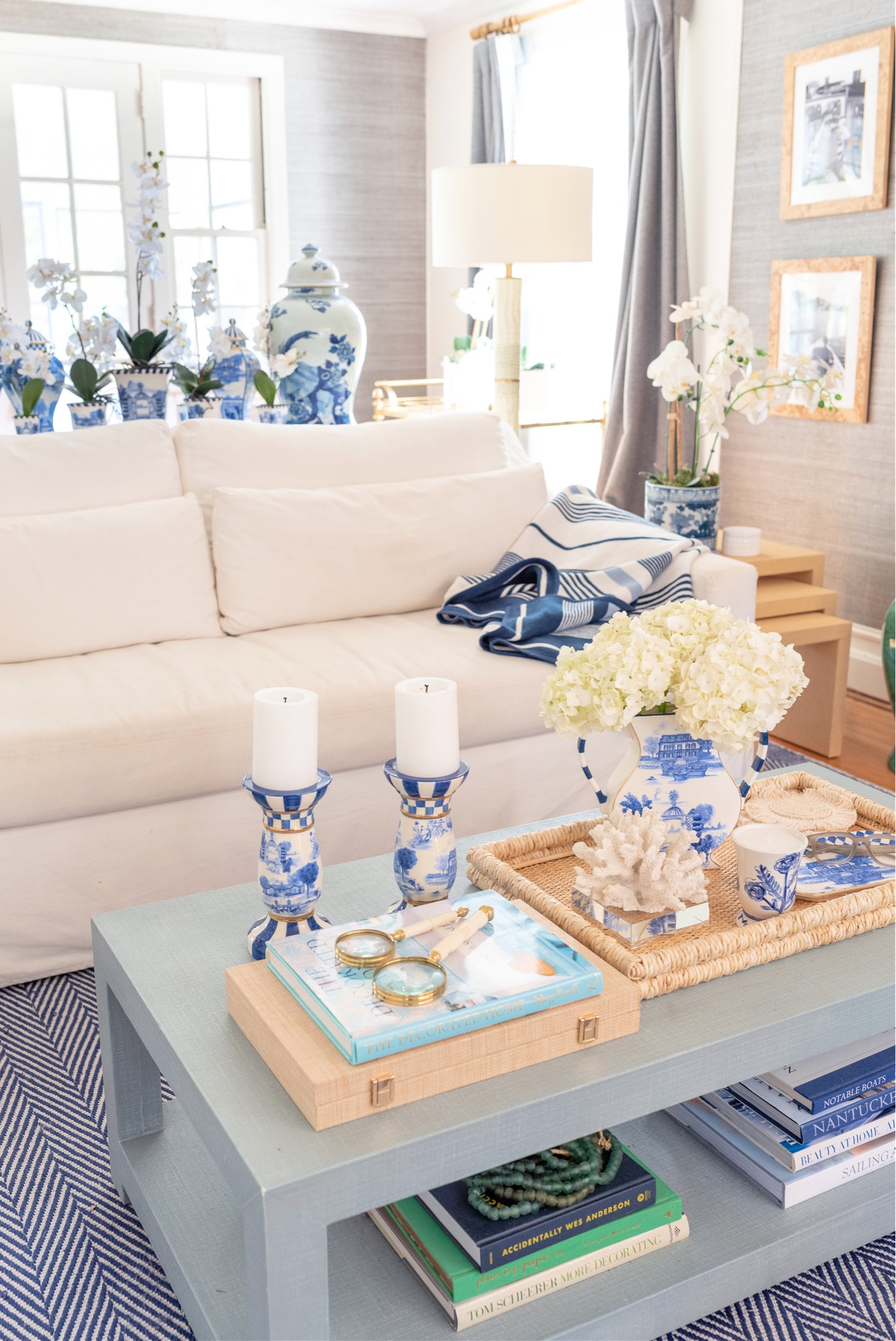 Sale 🔔 ‼️ Our coffee table is $500 off right now! Linking white sofa, blue and white candlesticks, raffia backgammon, blue herringbone rug, ginger jars, raffia gray, blue and white decor 

#LTKsalealert #LTKhome #LTKFind