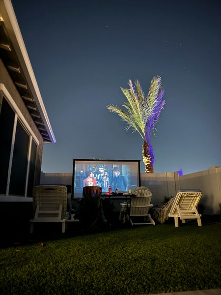 Outdoor movie projector and screen set up. This works great and we love it for movies in the backyard or pool! 

#LTKSeasonal #LTKHome