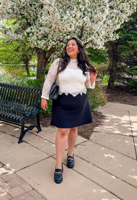 Lace top 
Skirt outfit 
Black skirt 
Preppy look 
Plus-size outfit 
Loafers 
Loafer style 

#LTKPlusSize #LTKShoeCrush #LTKStyleTip
