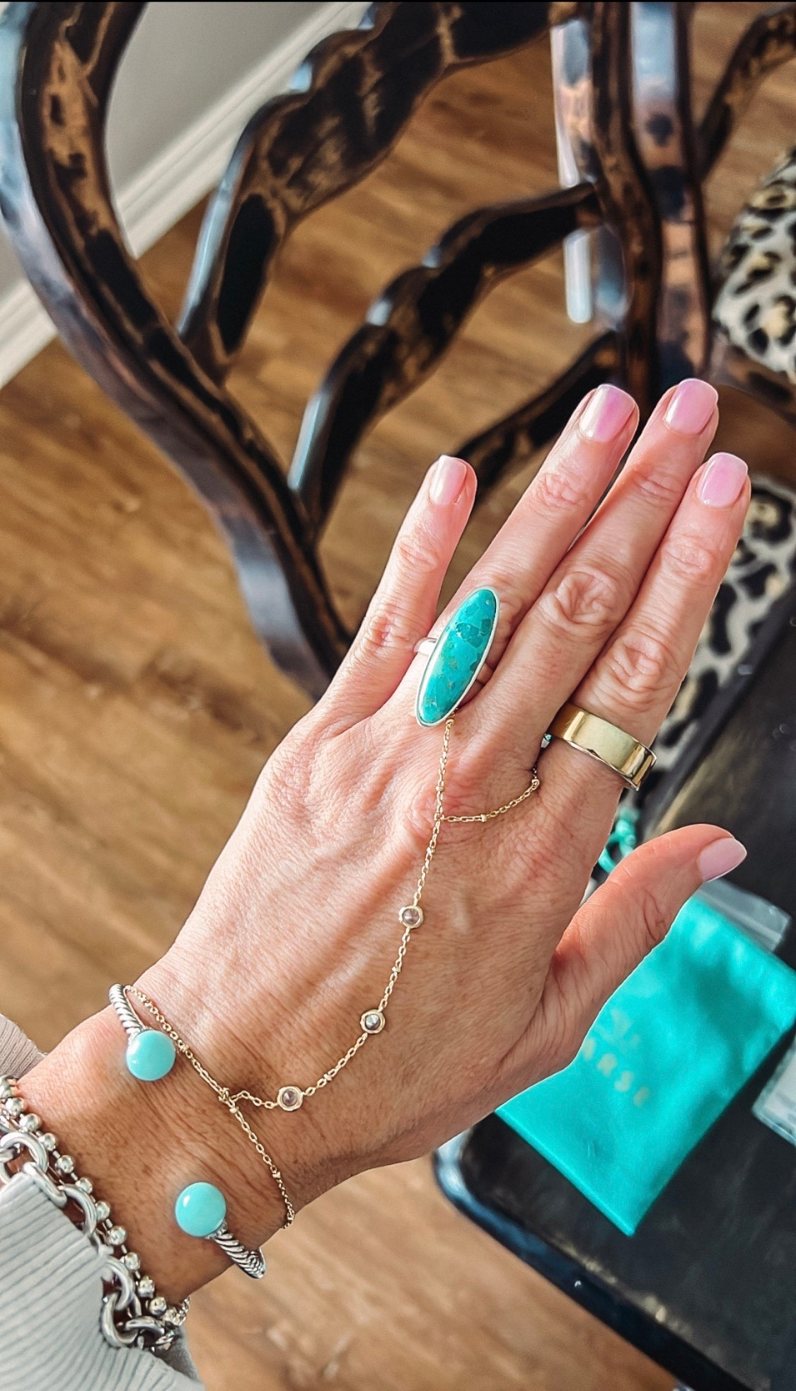 Turquoise ring and hand chain  

#LTKOver40 #LTKValentine