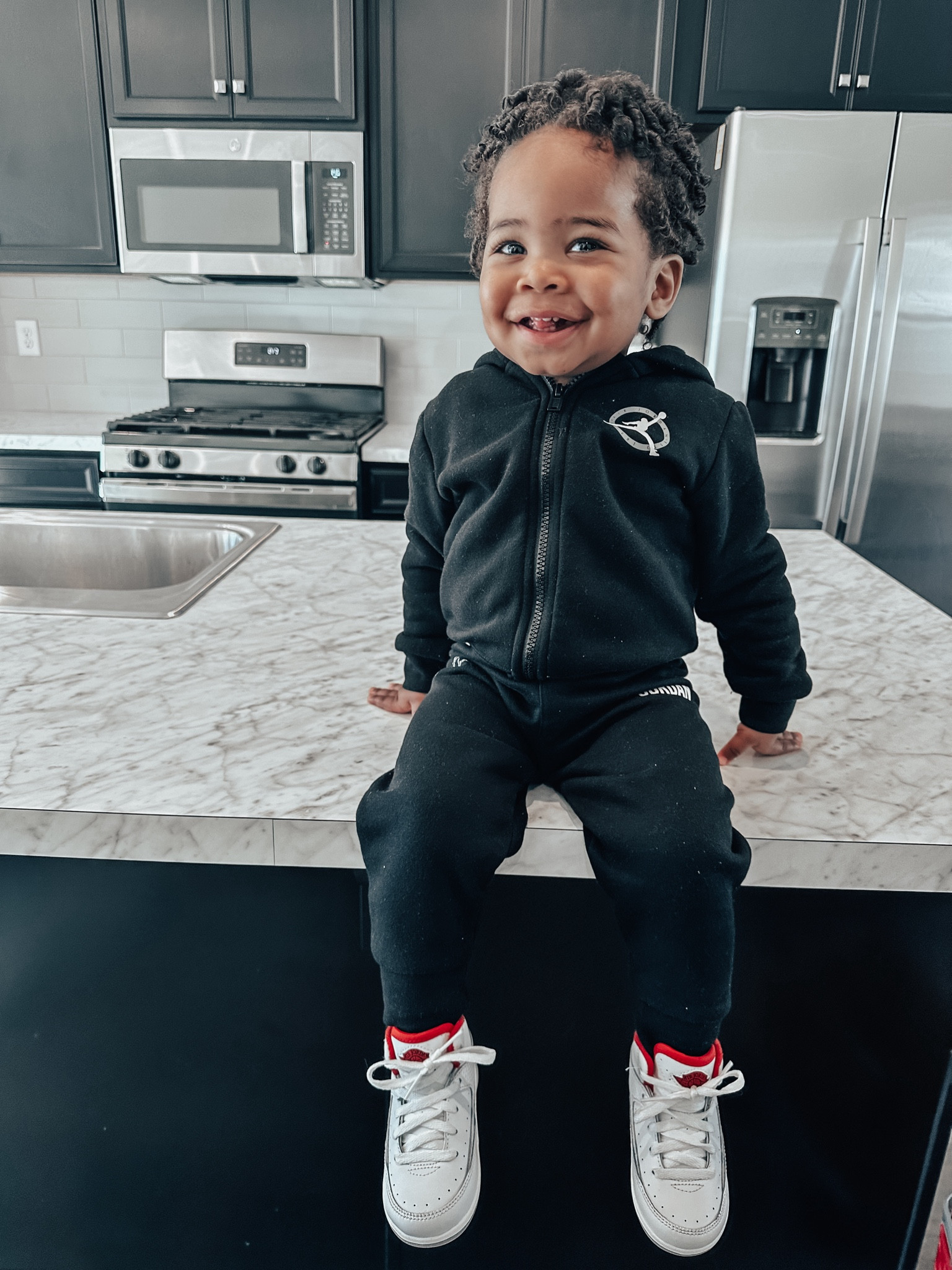 My toddler wearing the Jordan Flight MVP Full-Zip Set & Jordan Retro 2’s 

#LTKfindsunder100 #LTKkids #LTKbaby