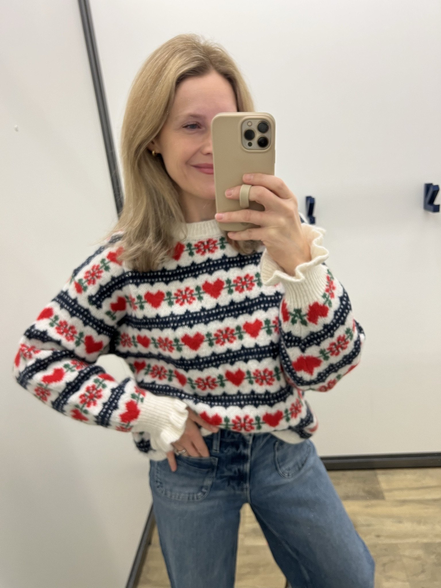 Old navy sweater that is perfect this time of year, winter fair isle with hearts?! Yes please! Sized up to a Large here. Could do a medium too. 

#LTKValentine
