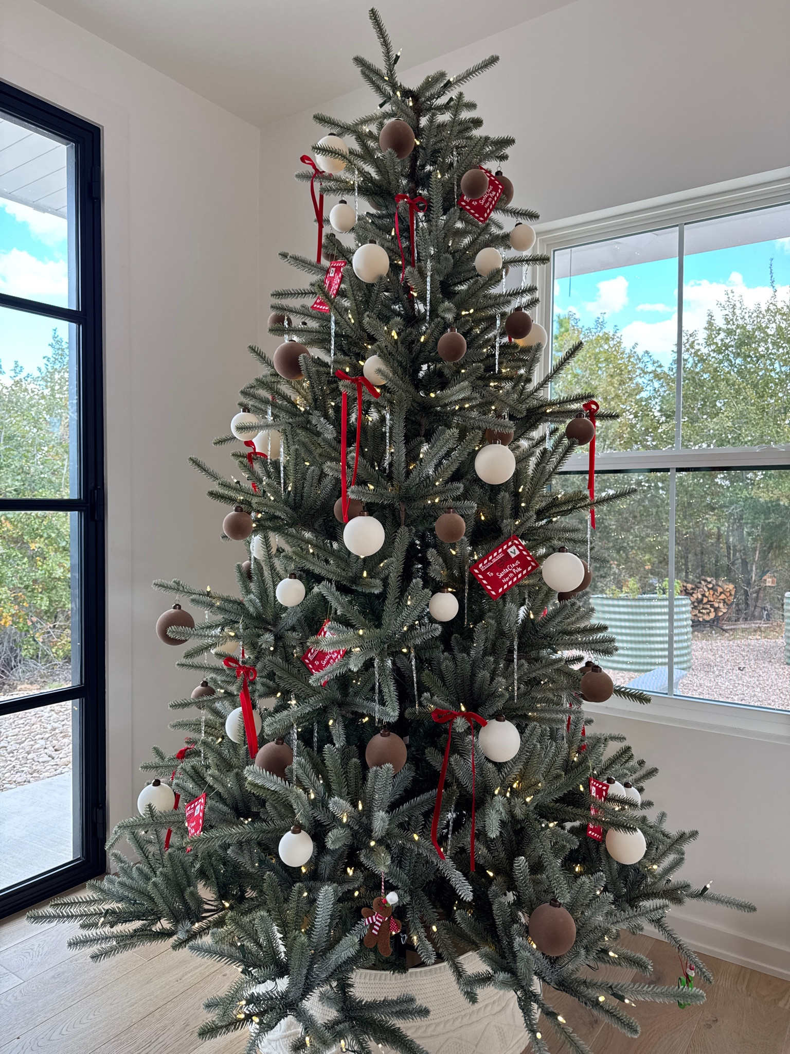 Tree: Balsam Hill
Ornaments: Hobby Lobby 
Ribbon, Icicle Ornaments, Tree Collar: Amazon 

#LTKHoliday #LTKSeasonal #LTKHome