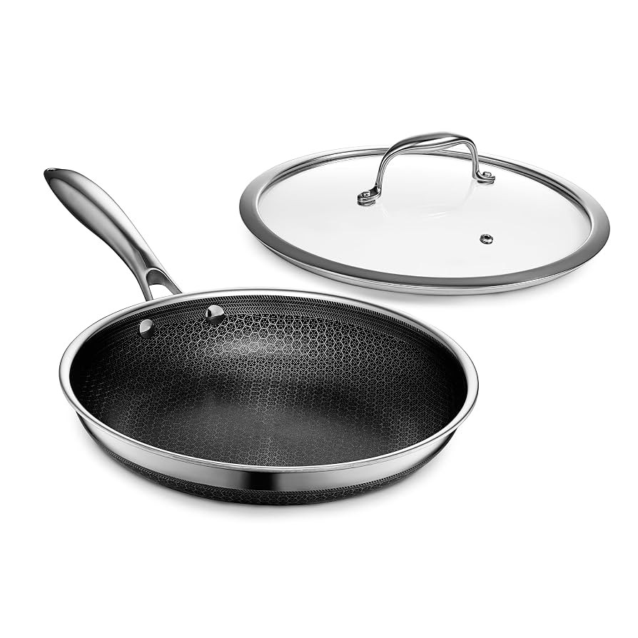 HexClad Hybrid Nonstick 10-Inch Frying Pan with Tempered Glass Lid, Stay-Cool Handle, Dishwasher-... | Amazon (US)