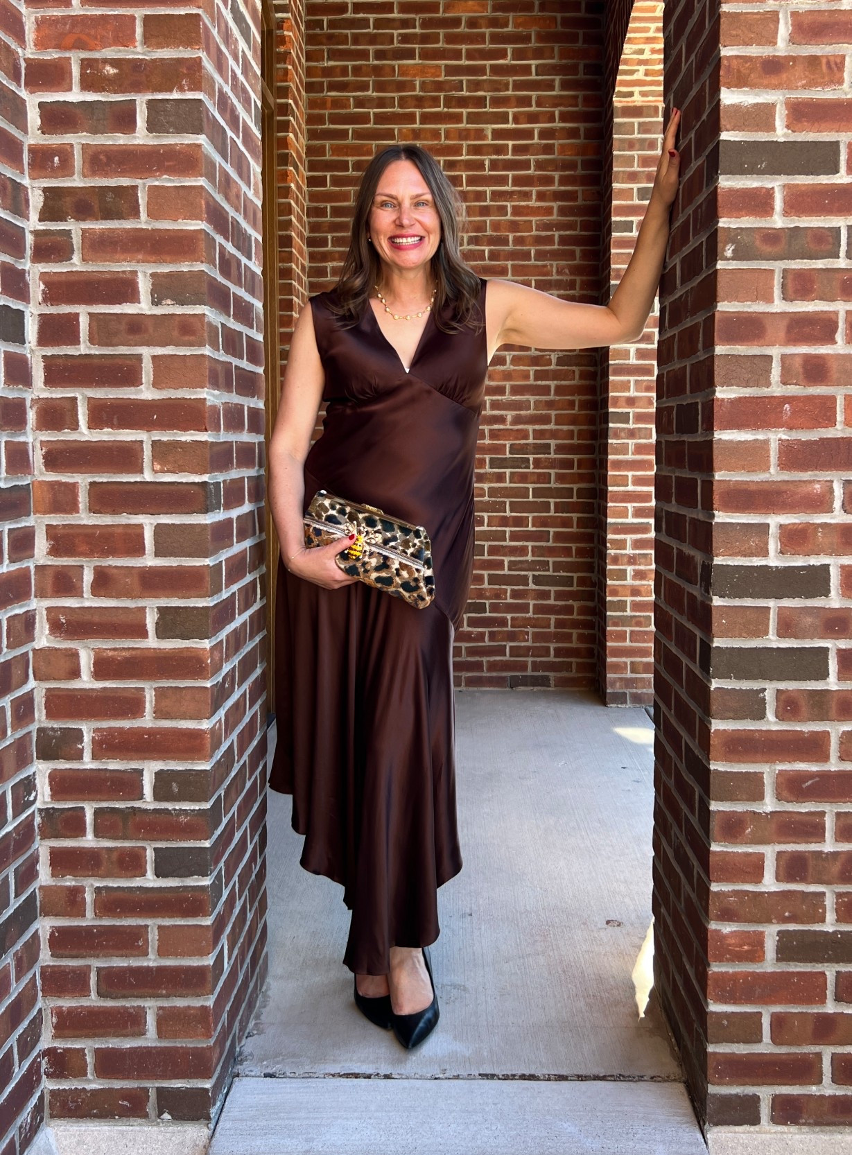 Chocolate brown is the new black! This satin crepe midi dress is a showstopper with elegant shirring details and asymmetrical skirt. Perfect for a wedding guest, dressy Fall occasion or date night! TTS and wearing a small. 
.
#celebratesavvy


#LTKHoliday #LTKOver40 #LTKWedding