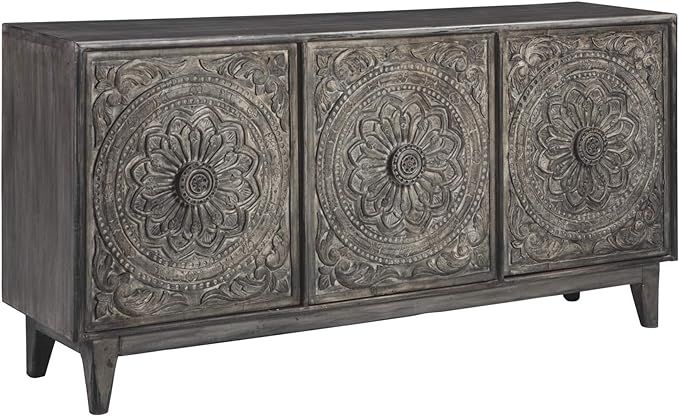 Signature Design by Ashley Fair Ridge Boho Hand Carved Wood Accent Cabinet or TV Stand, Dark Gray | Amazon (US)