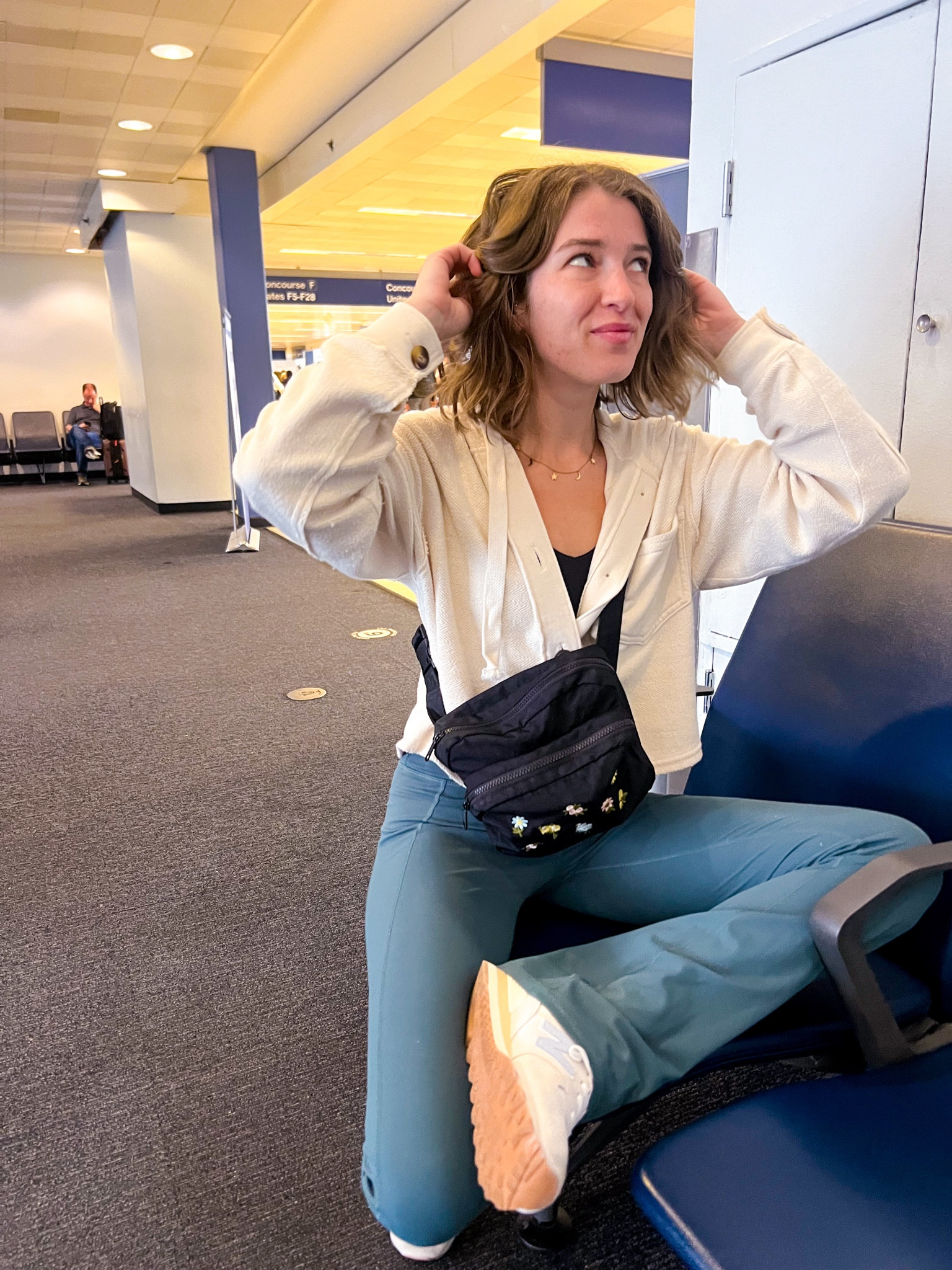 Airport fit check / comfortable airport fashion / Fabletics flares / American Eagle / baggu / new balance 

#LTKFindsUnder100 #LTKStyleTip #LTKItBag