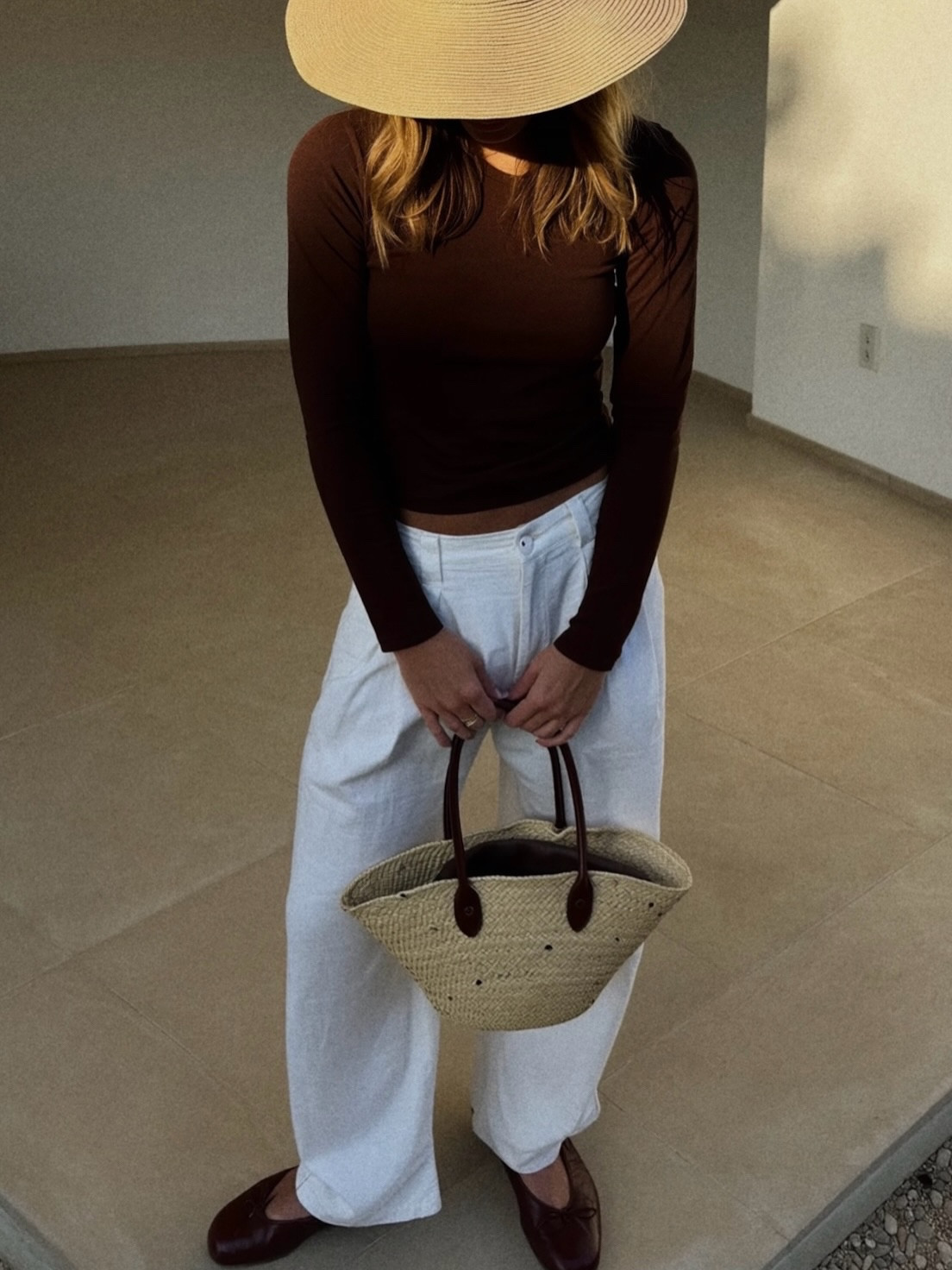 This outfit feels like a cappuccino with a twist of lemon 🍋 Warm, creamy, and fresh.

To recreate this modest and effortless summer look, you’ll need:
1. A brown long-sleeve top
2. Flowy white pants (linen or cotton for summer)
3. A classic straw bag (your seasonal essential)
4. Gold-tone accessories ✨ think minimal rings & earrings
5. Brown flats or espadrilles for everyday comfort

Et voila! This look perfect for a city stroll, a slow weekend, or a market morning.

Would you wear it?

Save this for later and drop a comment below 💬  I’d love to hear how you’d style it.
.
.
.
#capuccino #virtualstyling #virtualstylist #eurosummer #earlyautumn #lemons

#LTKSeasonal #LTKItBag #LTKShoeCrush