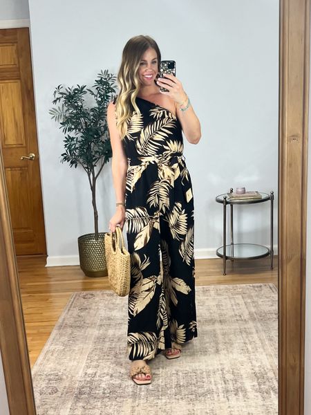 The perfect summer vacation jumpsuit! Love this one shoulder style. Ties at the waist for a slimming waistline. Such a fun print.  Wearing size small. Code Jacqueline15 for 15% off site-wide on orders $65+. Code
Super20 for 20% off site-wide on orders $109+  #ltkswim #ltkfindsunder50 #ltksalealert

#LTKSaleAlert #LTKFindsUnder50 #LTKStyleTip