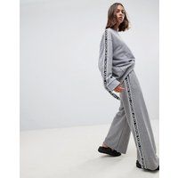 Cheap Monday Margin tape side wide leg joggers - Grey melange | ASOS BE