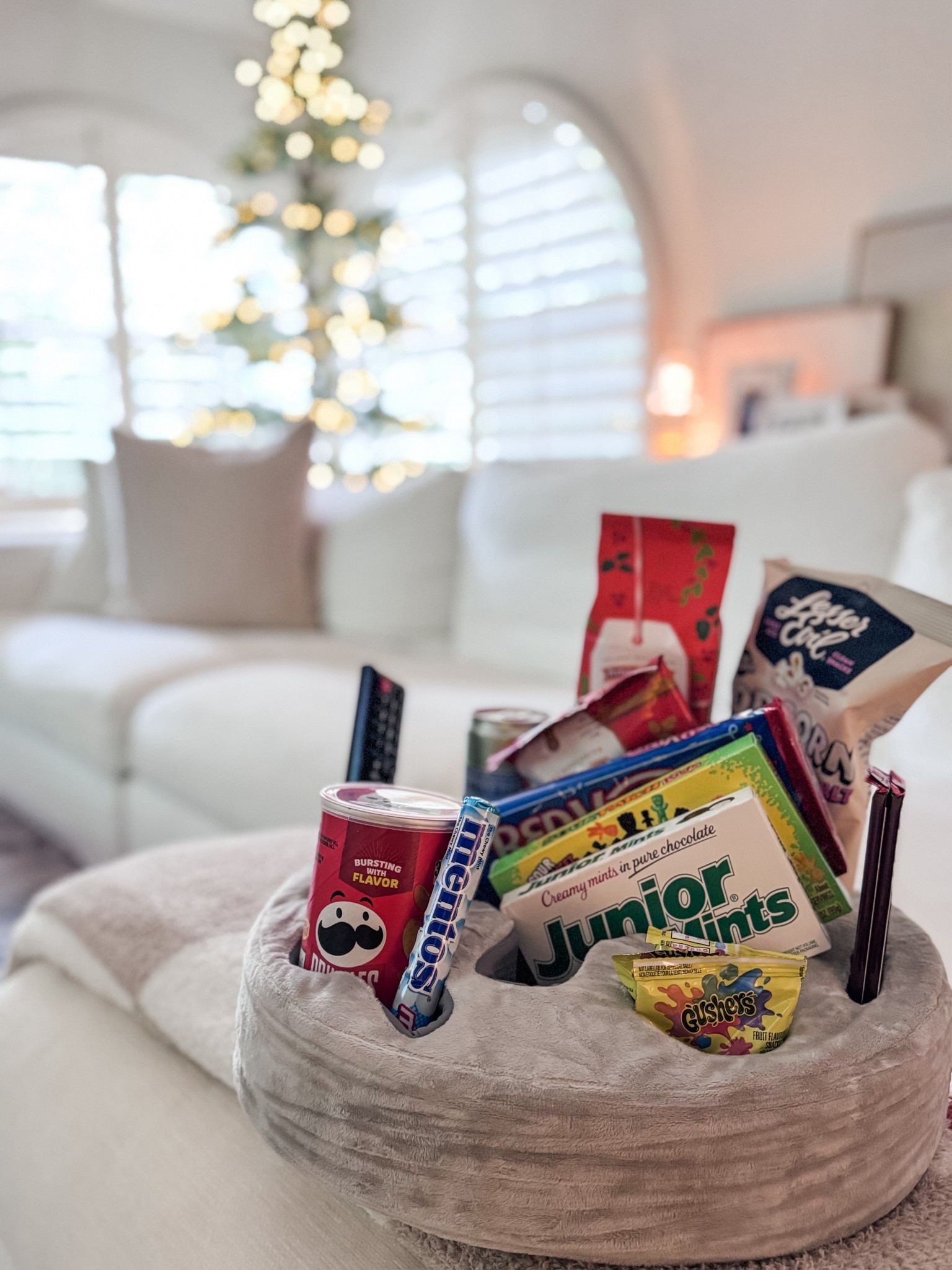 The best little gift for the movie lover, sports fan or gamer in your life - this cushion with lots of pockets for drinks, snacks and remotes/controllers. Bought one for each of my kids - my boys are in college and my daughter is a super tv show girlie…so fun!

#LTKHoliday #LTKGiftGuide #LTKmomlife