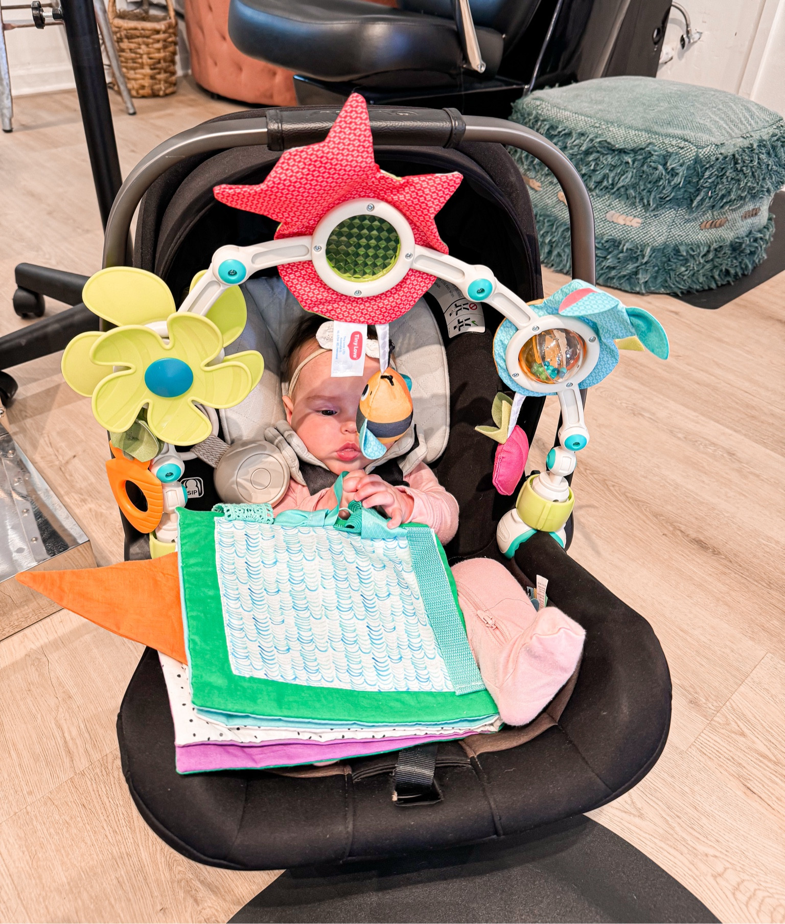 Busy flower screw on toy ideal for strollers, certain baby bounce seats & car seats but please DO NOT KEEP ATTACHED TO THE CAR SEAT WHEN DRIVING. I put it on the car seat at the salon to keep some simulation going for my daughter I do feel it’s better or a baby about 6 months plus!

The fun scrunch ribbon book came from the lovevery kit I linked below I also linked other scrunch books, my daughter absolutely loves that toy! 

#LTKbump #LTKfamily #LTKbaby
