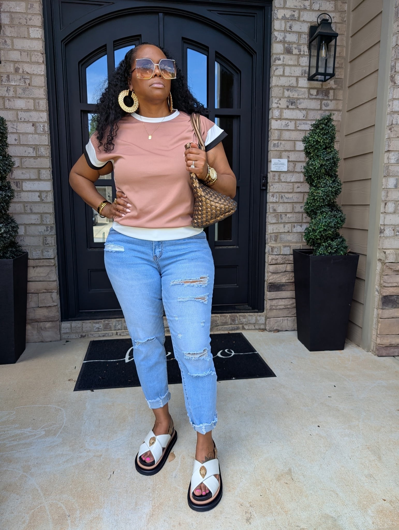 Serving casual luxe in a colorblock top, distressed denim, and statement slides—finished with bold accessories and a woven shoulder bag.

Top M | Jeans L | Kurt Geiger sandals | Woven shoulder tote

Soft life, styled right. ✨

#CasualLuxe #DistressedDenim #Over40Style #BoldAccessories #EffortlessFashion #LTKAtlanta #EverydayChic #ImTashaMack #StyleWithEase #SoftLifeStyledRight #LTKStyle 

#LTKOver40 #LTKShoeCrush #LTKFindsUnder50