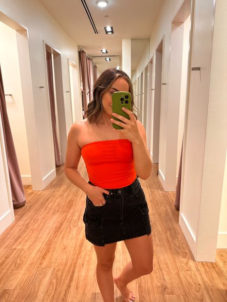 I’m not usually a tube top girl, but this orange tube top is a summer must-have! Paired with the cutest black denim skirt - it’s a cargo mini skirt. I would wear this out to dinner on a patio!

#LTKfestival #LTKcanada #LTKstyletip