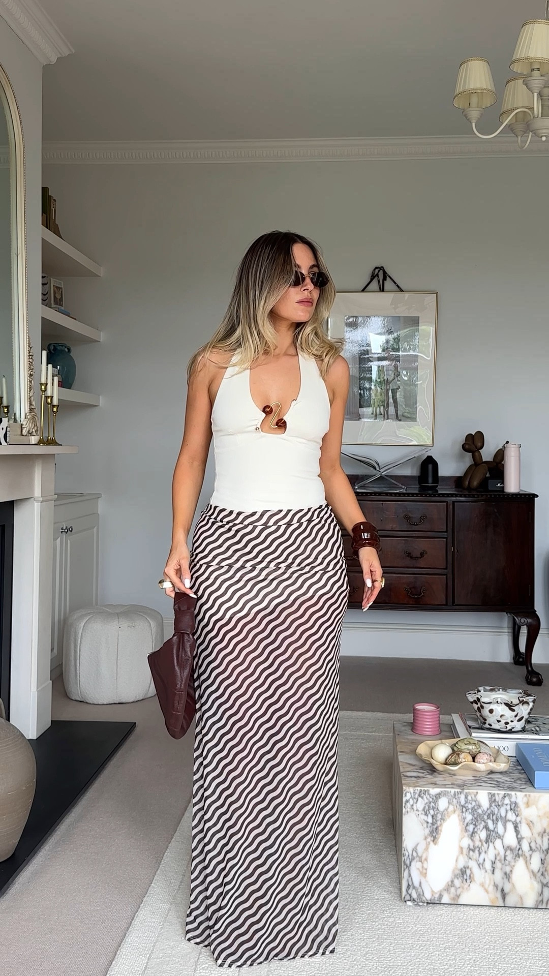 3 looks when its girls night *and* there’s a heatwave 💃🏼🍸

Look 1; 
Skirt size S
Top size XS Bag is Lemaire

Look 2; 
Bodysuit is XS
Trousers are old H&M but have linked a pair I just got which are glorious!

Look 3; 
Wearing a size 10 in both top & trousers