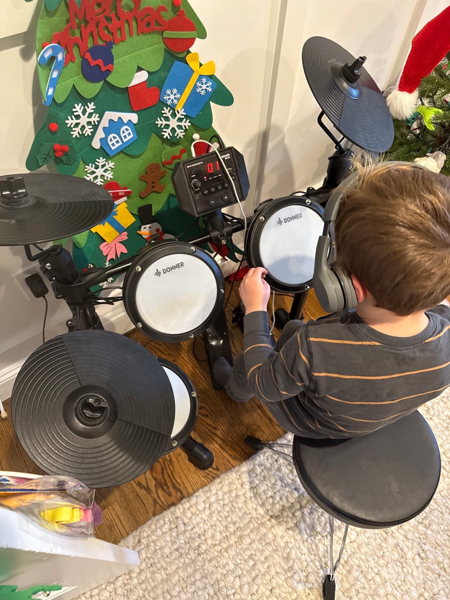 Drum set was a hand me down from one of Logan’s friends, but he loves it! Best part is you can plug in headphones so you don’t have to listen to the noise. Linked his exact model, but they have others 

#LTKGiftGuide #LTKKids