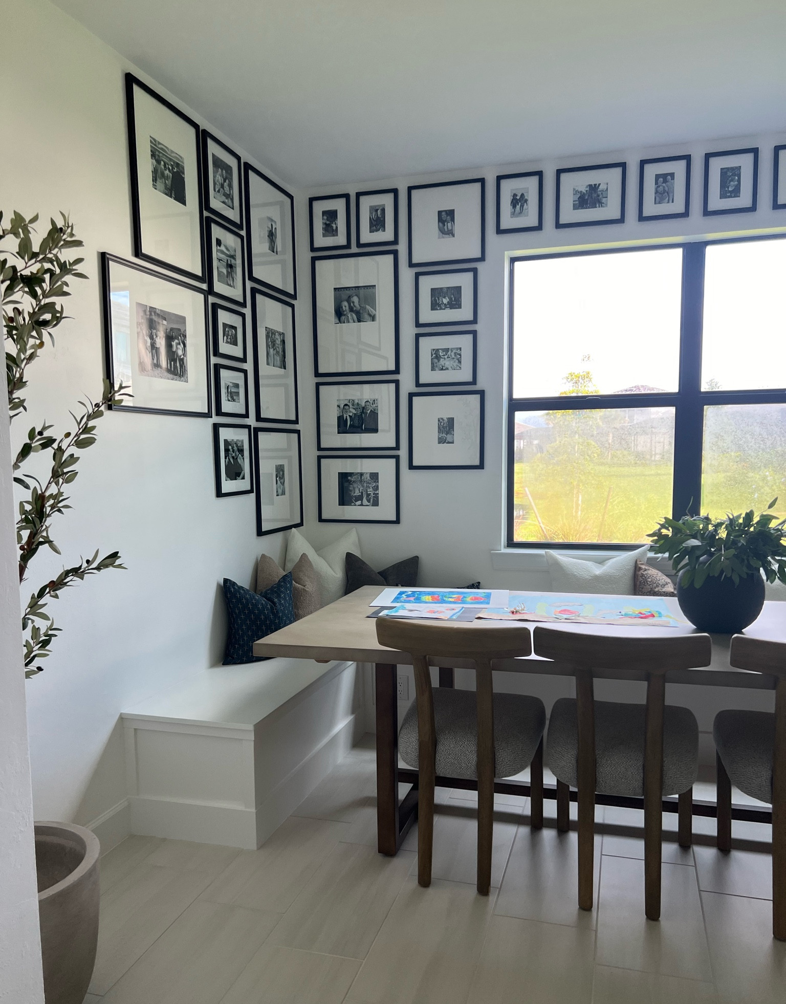 Banquet bench seating with black Target frame collage 

#LTKfindsunder50 #LTKhome