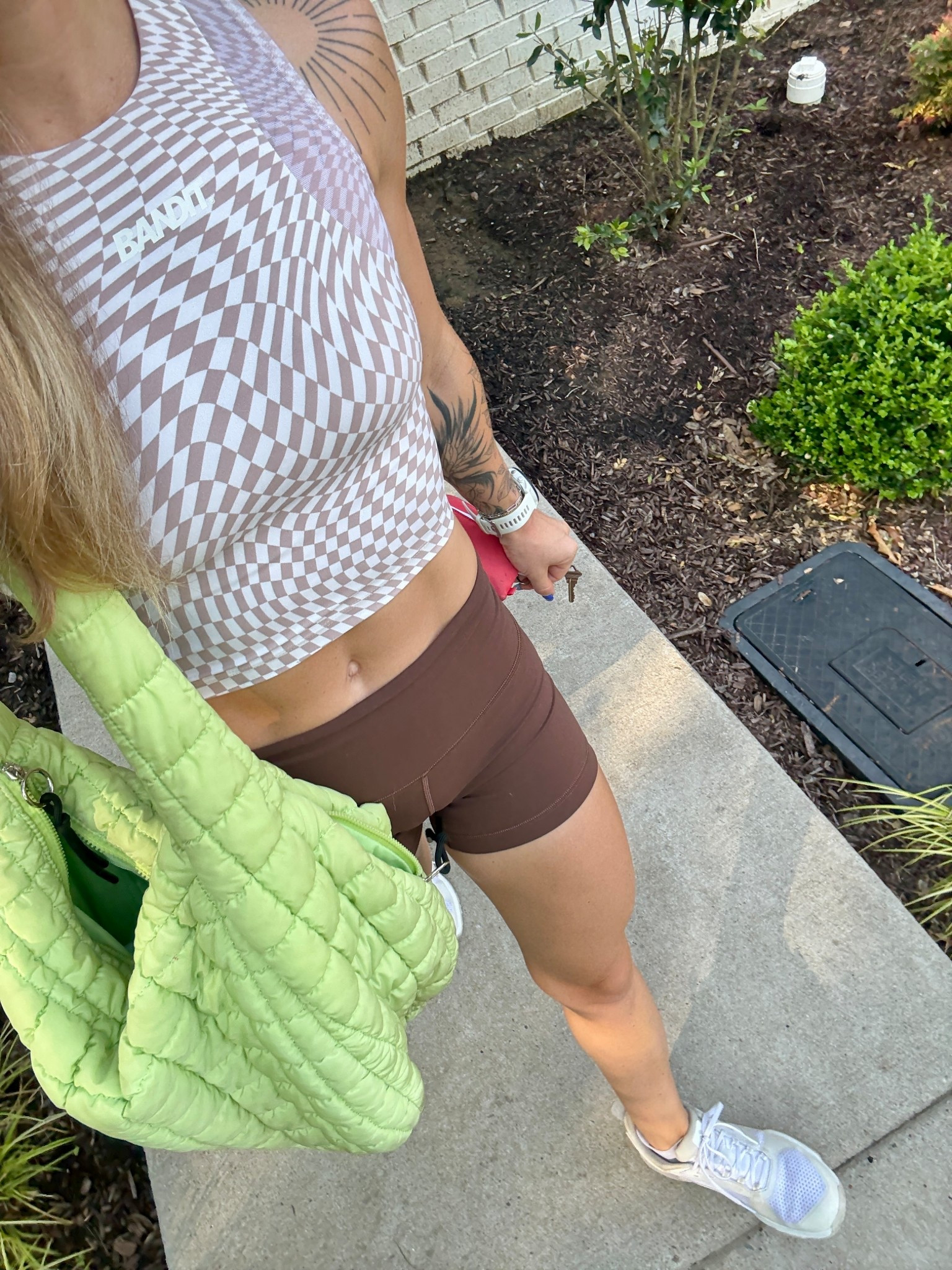 Top is Bandit Running (Stamina™ Lyra Race Crop - Chalk with Cocoa) size small, size 4 shorts. Color is Java  