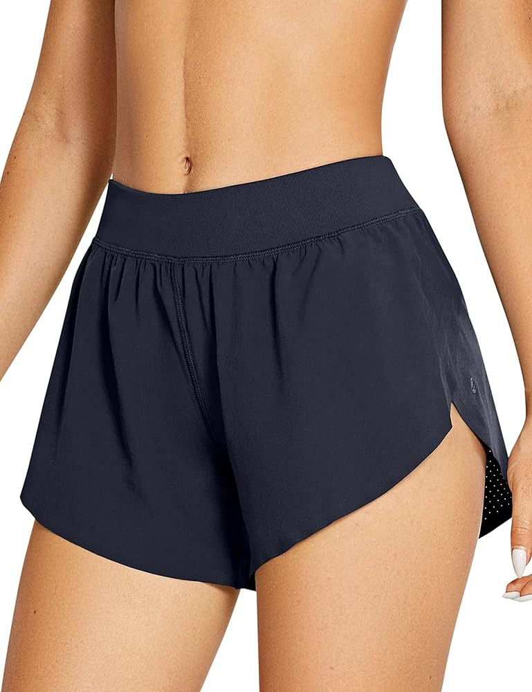 CRZ YOGA Women's Mid Rise Dolphin Running Shorts Quick Dry Lightweight Split Liner Breathable Ath... | Amazon (US)