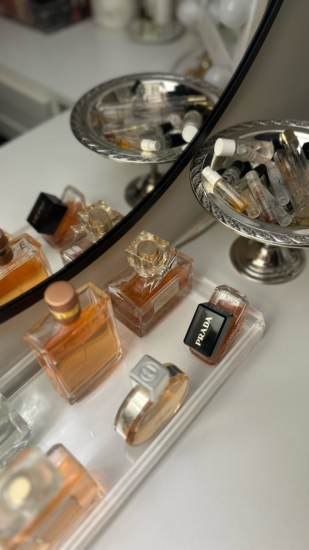 Keeping my fragrance organization simple and neat. Acrylic tray to hold all my full size bottles and a vintage dish for my samples.

#LTKBeauty #LTKselfcare #LTKgrwm